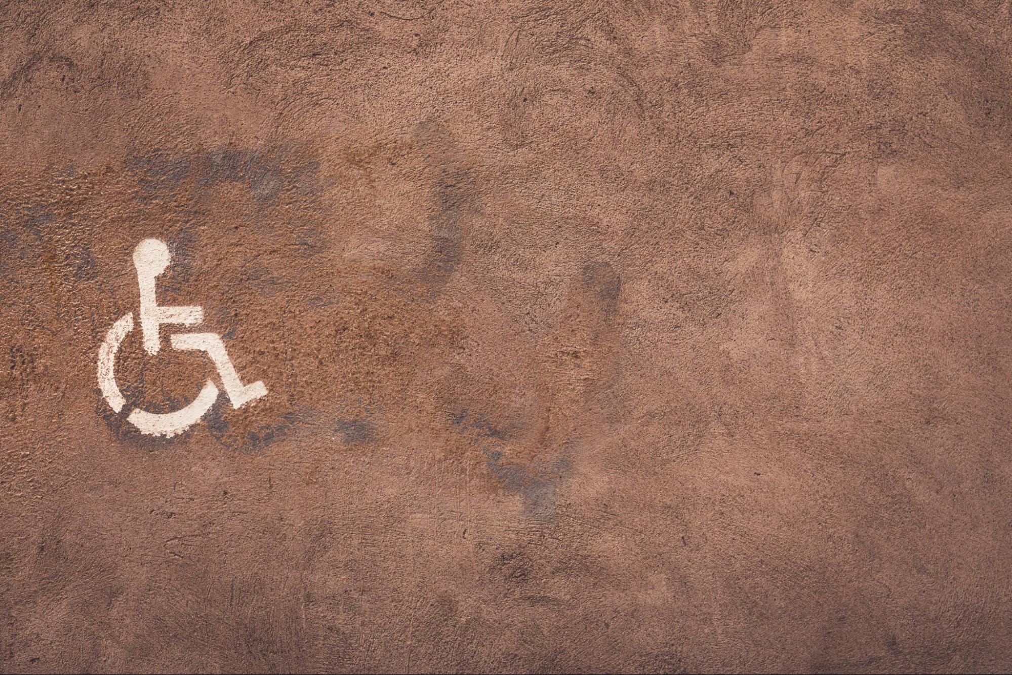 An overhead view of a disability icon on the ground