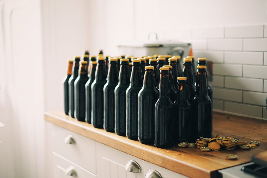 A shelf with neat lines of bottles